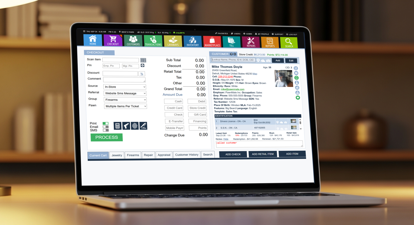 PawnMate checkout and customer screen displayed on a laptop
